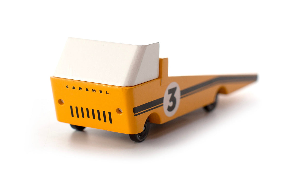 Toy truck with 'Caramel' branding and number '3' on a white background