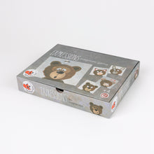 Cardboard box with teddy bear illustrations on a white background