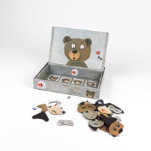 Set of bear-shaped hair clips with packaging on a white background