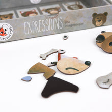 Wooden animal face pieces with 'Expressions' packaging on a white background