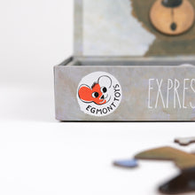Small box with a teddy bear illustration and 'Egmont Toys' logo on a white background