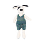 Stuffed toy dog wearing striped overalls on a white background
