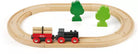 Wooden train set with tracks and trees on a white background