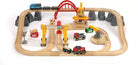 Wooden toy train set with tracks, bridges, and various train cars on a white background