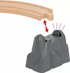 Gray plastic component with a wooden rail on a white background