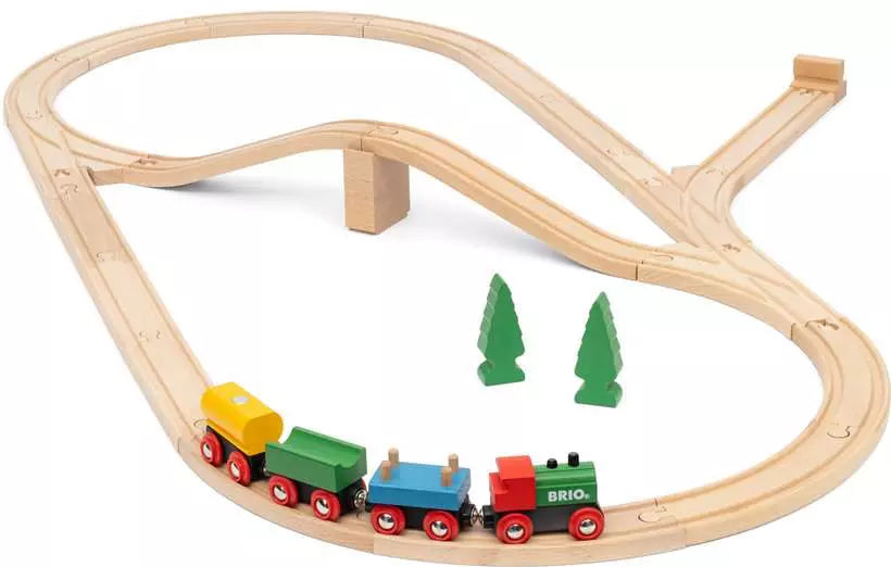 Wooden train set with tracks and toy train on a white background