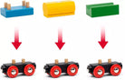 Colorful wooden train track pieces with arrows indicating direction on a white background