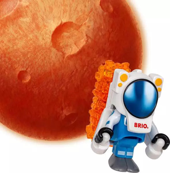 Brio World astronaut figure wearing a blue and white spacesuit with an orange backpack, standing in front of a red planet surface.