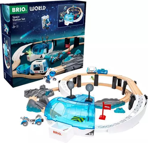 Space Station Set by Brio product box alongside the assembled 40-piece wooden train and space exploration playset featuring a central blue-domed space lab, elevated planetary tracks, a space rover, an astronaut figure, and scenery pieces on a white background.