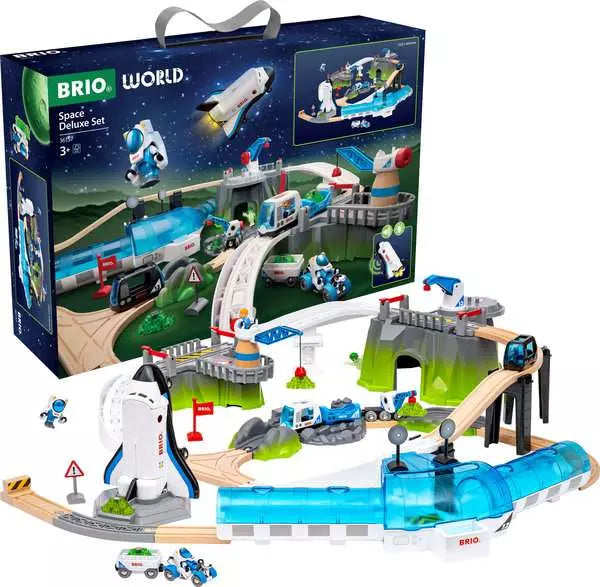 A Space Deluxe Set by Brio box shown next to its fully assembled toy contents laid out on a white background, featuring a wooden and blue translucent track system, a space station, space shuttle, mountain tunnels, and figures.