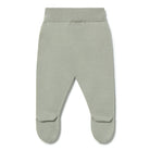 Green baby pants with footies on a white background
