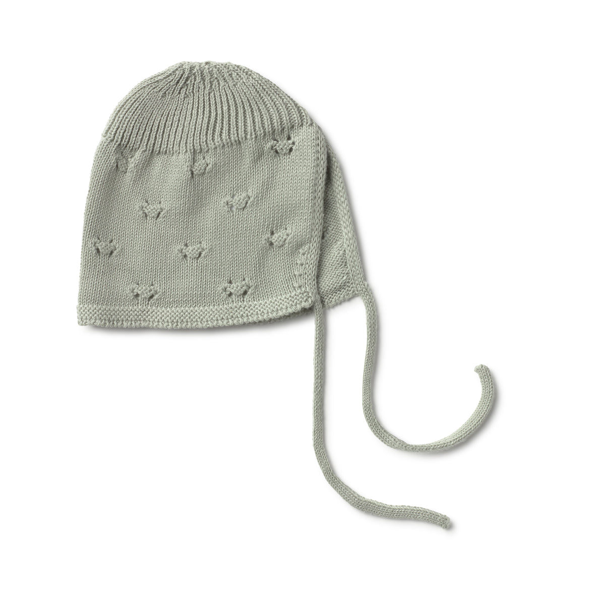Knitted pink baby hat with earflaps on a white background