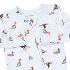 Featuring an all-over print of various ducks and geese in muted brown, blue, and orange tones.