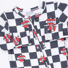 A long-sleeve baby romper featuring a black and white checkerboard pattern with red and white heart graphics that read 'DAD MOM'.