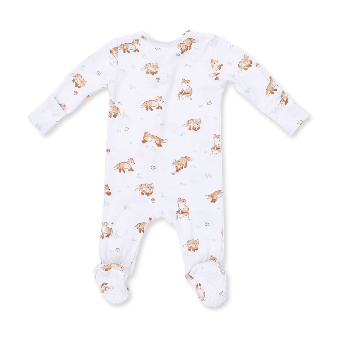 A baby long-sleeve footed sleeper in white with an all-over print of brown foxes and small pinecones, laid flat on a white background.