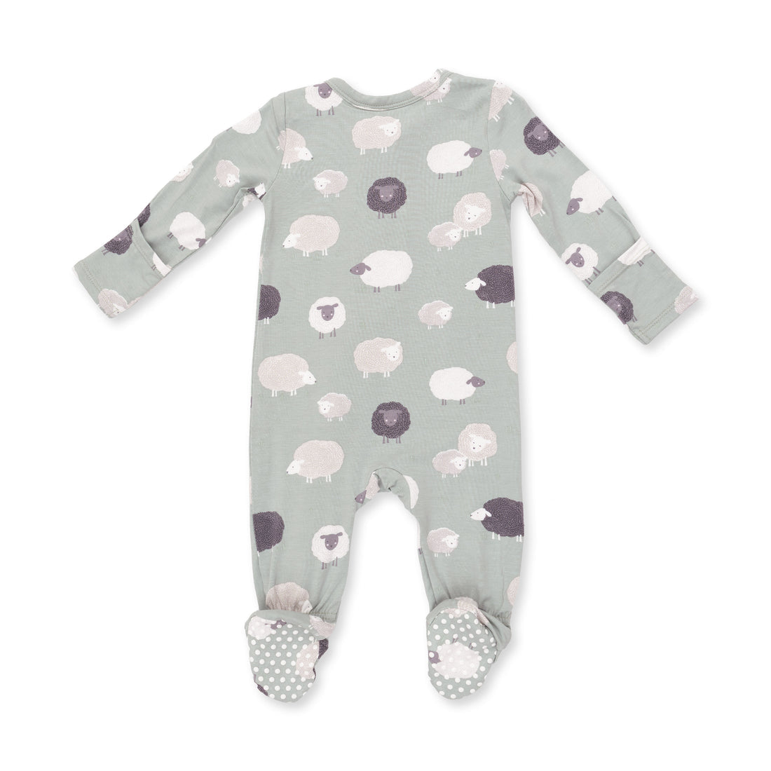 A baby long-sleeve footed sleeper in a sage green color, featuring an all-over print of stylized sheep in white, light pink, and dark purple, with matching patterned footies.