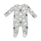 A baby long-sleeve footed sleeper in a sage green color, featuring an all-over print of stylized sheep in white, light pink, and dark purple, with matching patterned footies.