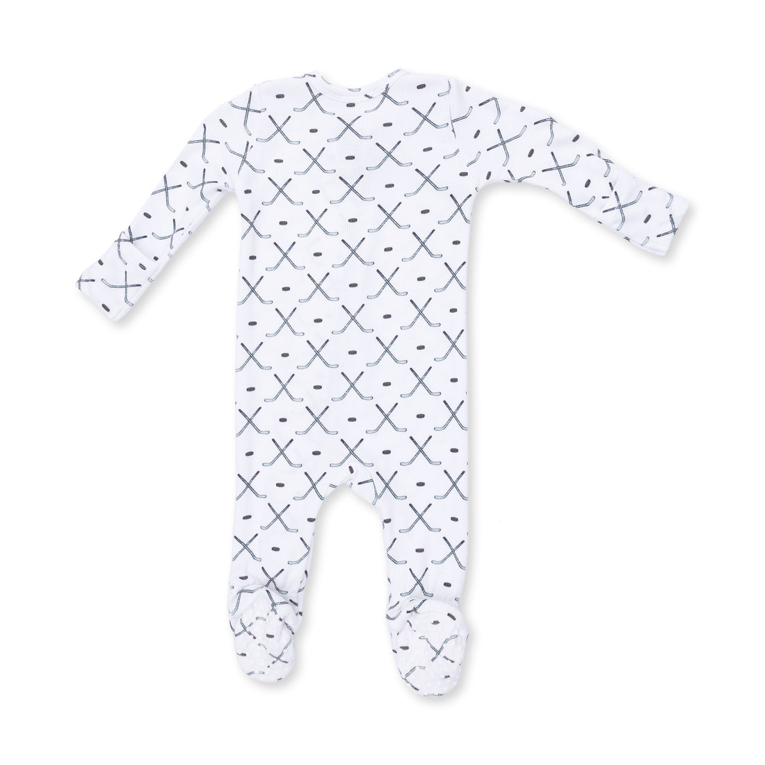 White baby onesie with black pattern on a white background