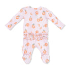 Baby onesie with peach pattern on a white background