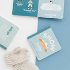 Set of snow-themed cards with illustrations and text on a blue and white background