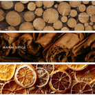 Three horizontal panels showing warm, dried natural scent ingredients: stacked wood logs labeled WOODS, rolled warm spices labeled WARM SPICE, and dried citrus slices labeled CITRUS, all in a warm brown color palette.