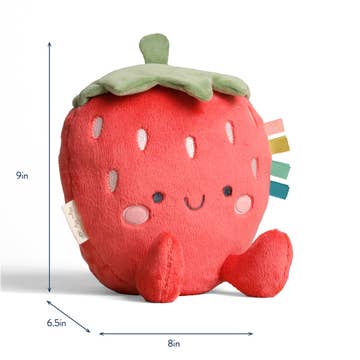 Plush strawberry toy with smiley face and measurements on a white background