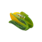 Corn-shaped clip with yellow corn kernel and green husk on a white background
