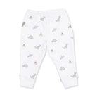 White baby jogger pants with an all-over print of small dinosaurs and teepees, shown flat on a white background.
