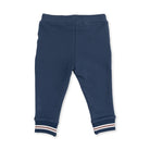A pair of navy blue baby jogger pants with striped ribbed cuffs, shown flat on a white background.