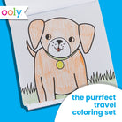 A children's coloring book or coloring card featuring a cartoon puppy illustration, shown on a bright blue background with the text 'the purrfect travel coloring set' and an 'ooly.' logo.