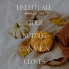 Autumn-themed text overlay with pumpkins and a knitted blanket on a white background.