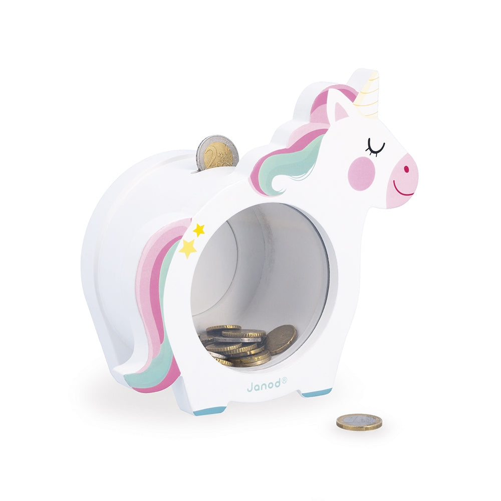 Unicorn-shaped children's piggy bank with coins on a white background