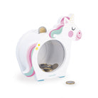 Unicorn-shaped children's piggy bank with coins on a white background