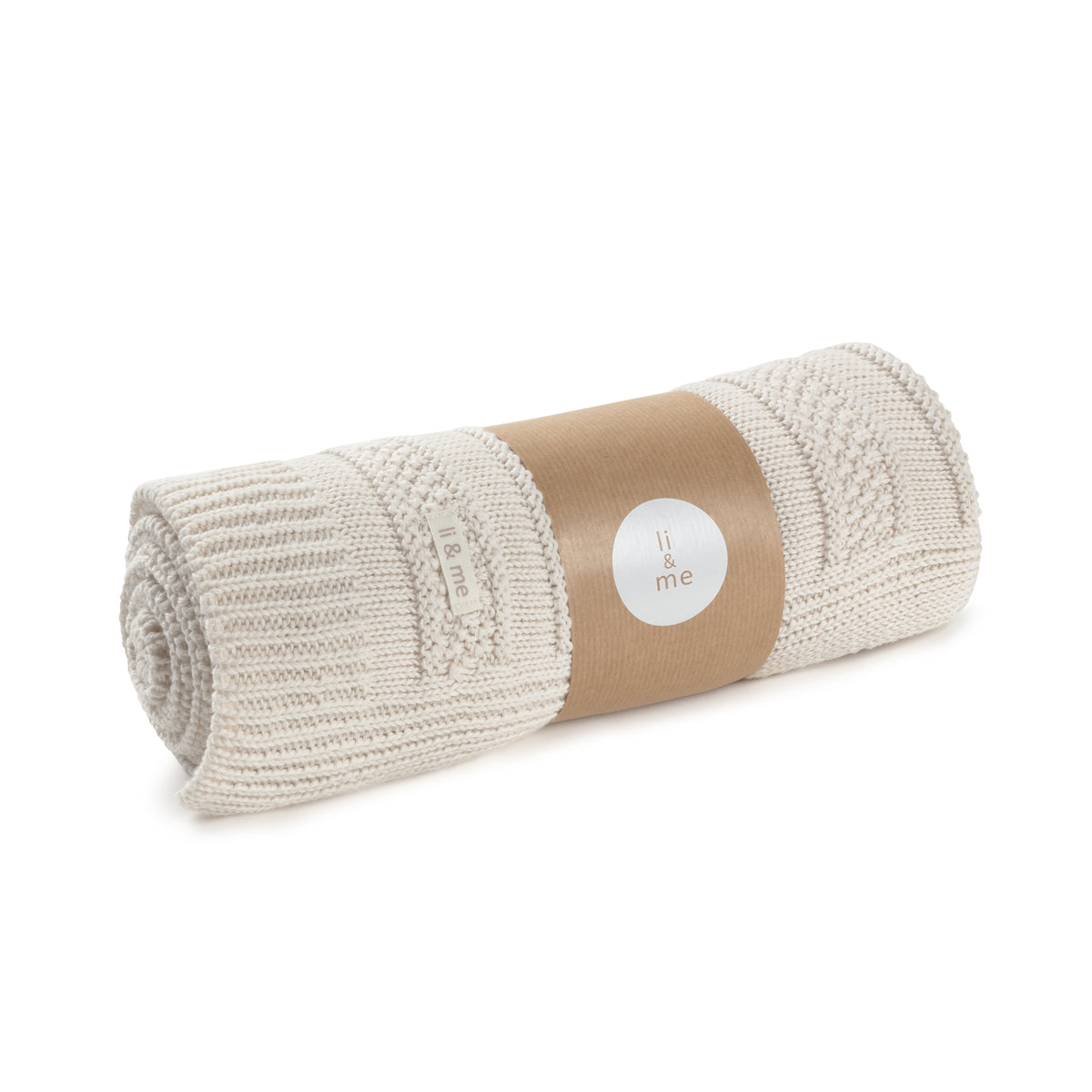 Rolled-up beige blanket with a brown paper wrap and white label on a white background