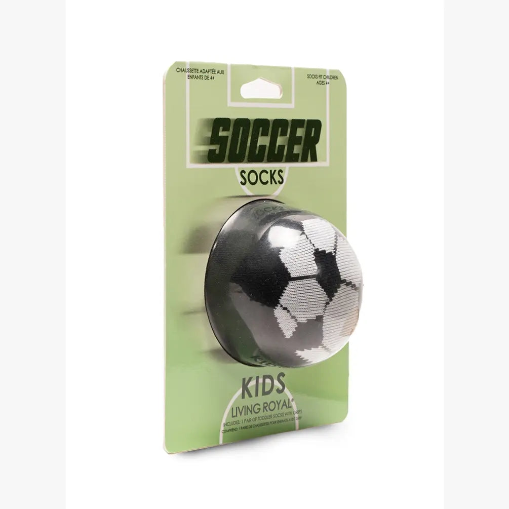 Packaged soccer socks for kids with a green label on a white background