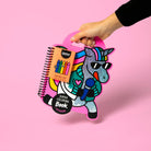 Colorful coloring book with a cartoon character on a pink background