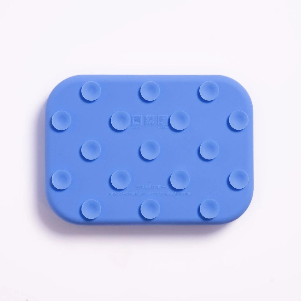 Blue rectangular silicone mat with raised circular nodes on a white background