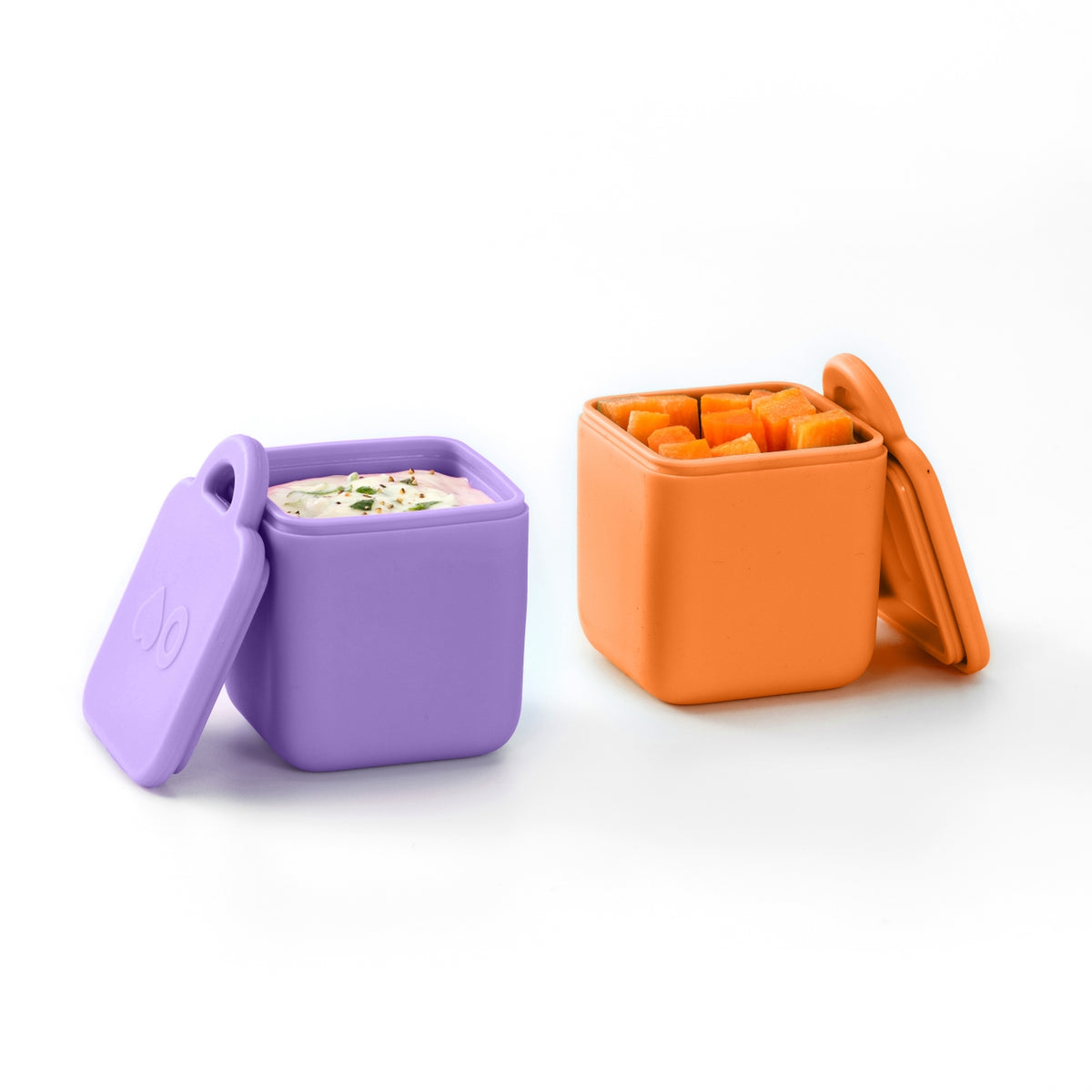 Purple and orange silicone containers with lids on a white background