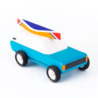 Toy car with a colorful roof on a white background