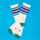 White socks with 'MAMA' text on a blue background