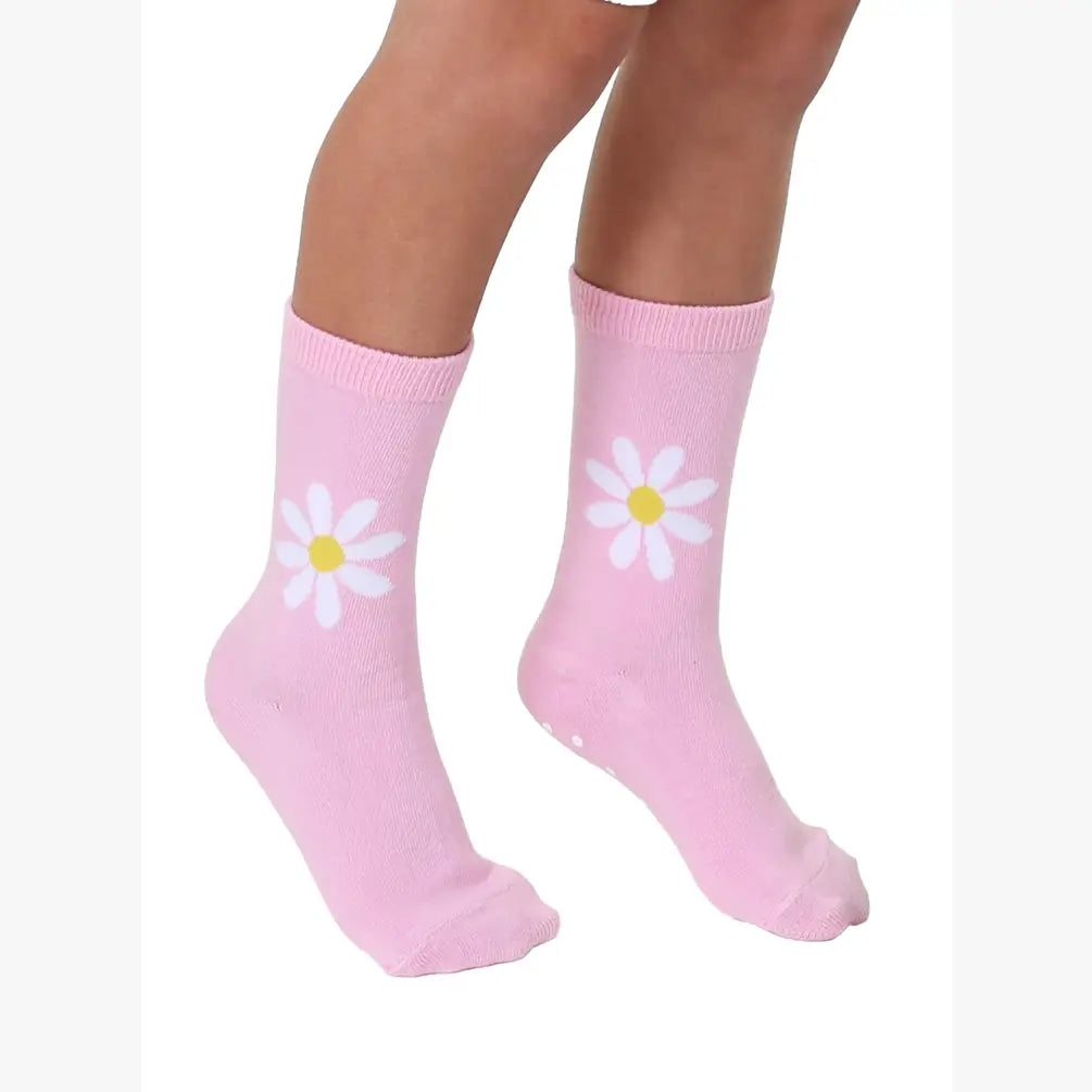 Pink socks with white daisy flowers on a white background