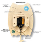 Wooden owl-shaped clock with label details on a white background
