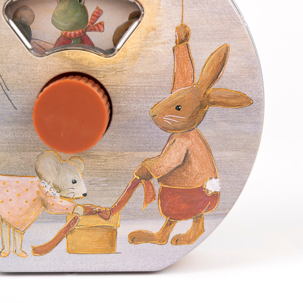 Wooden toy with illustrations of a rabbit, mouse, and frog on a white background