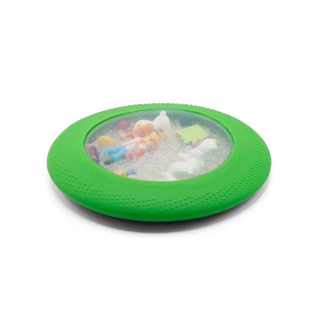 Green pet toy with colorful beads and balls on a white background