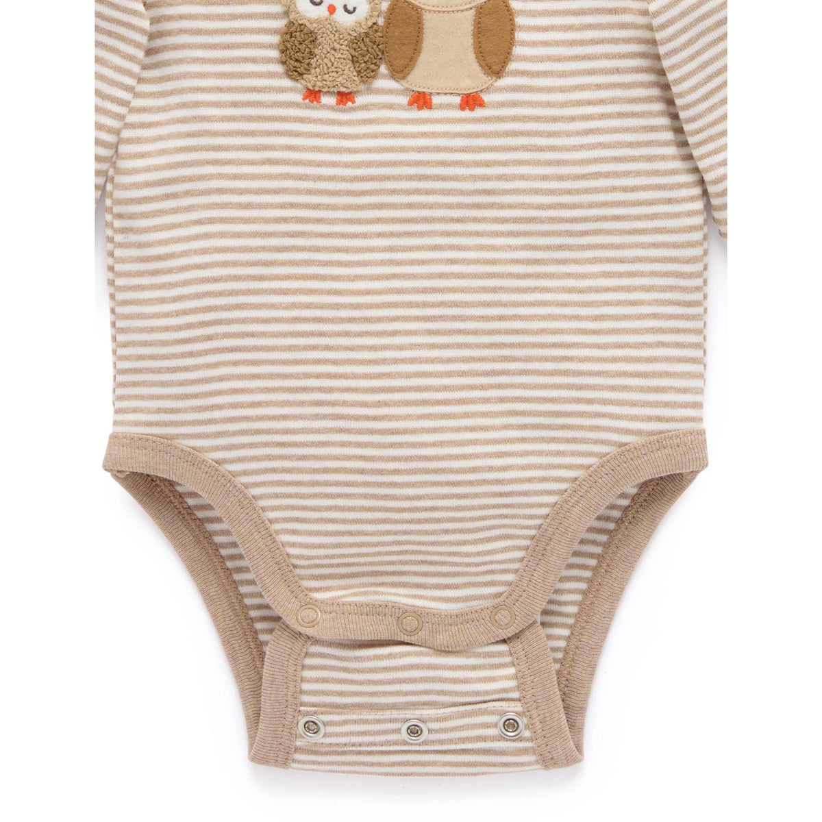 A long-sleeve baby bodysuit with thin beige and white horizontal stripes, featuring an embroidered owl design on the chest and snap closures at the crotch and shoulder.