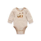 A long-sleeve baby bodysuit with beige and white horizontal stripes, featuring a central graphic of two cute cartoon owls and a small brand label on the sleeve.