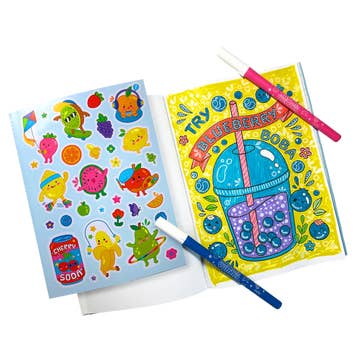 Colorful greeting cards with stickers and pens on a white background