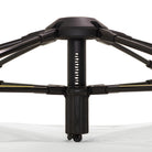 Black metal stand with adjustable legs on a white background