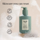 Green shampoo and body wash bottle with Kyte Skin label on a beige background with bubbles.