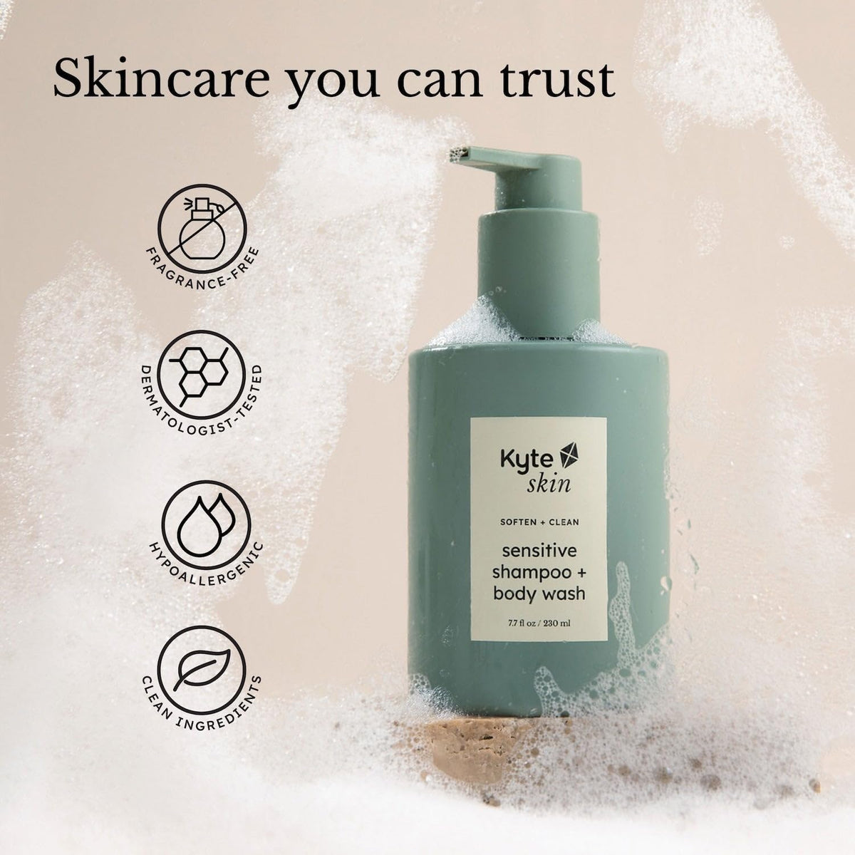 Green shampoo and body wash bottle with Kyte Skin label on a beige background with bubbles.